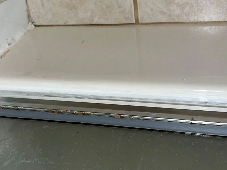 Sill and fixtures left clean in an occupied building