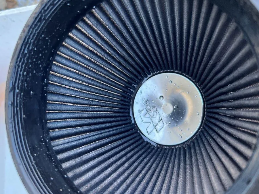 Filter media cleared of grease with fibers intact