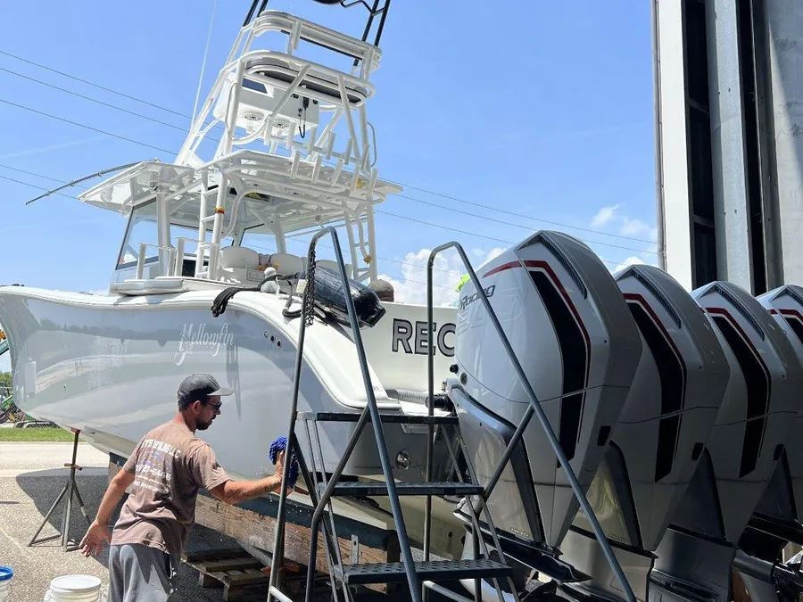 Hull and topsides washed dockside without acid brighteners